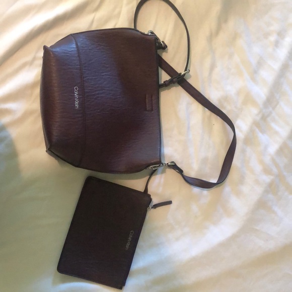 Calvin Klein burgundy bucket bag.